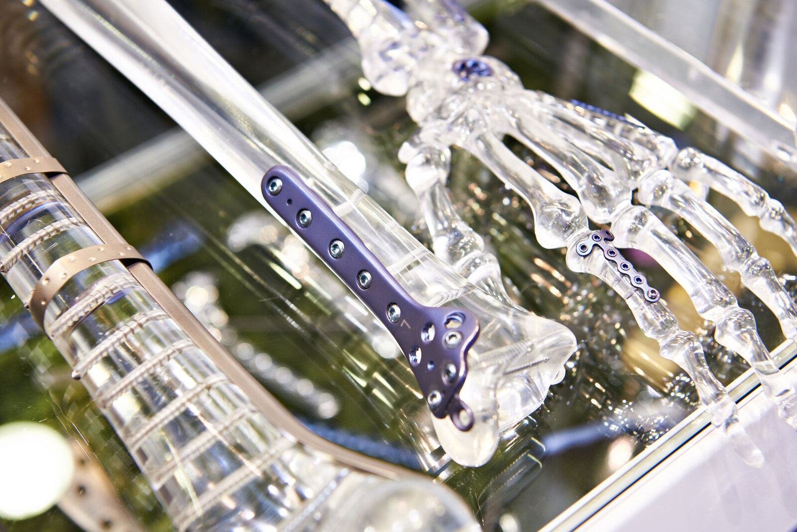 Precision-machined medical implant components in a clear inspection case