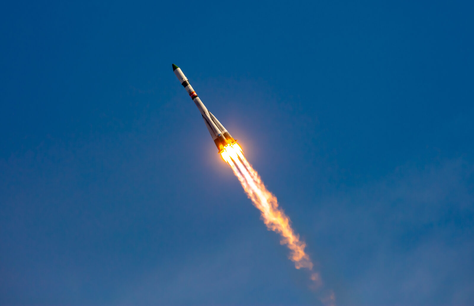 Rocket ascending with exhaust plume