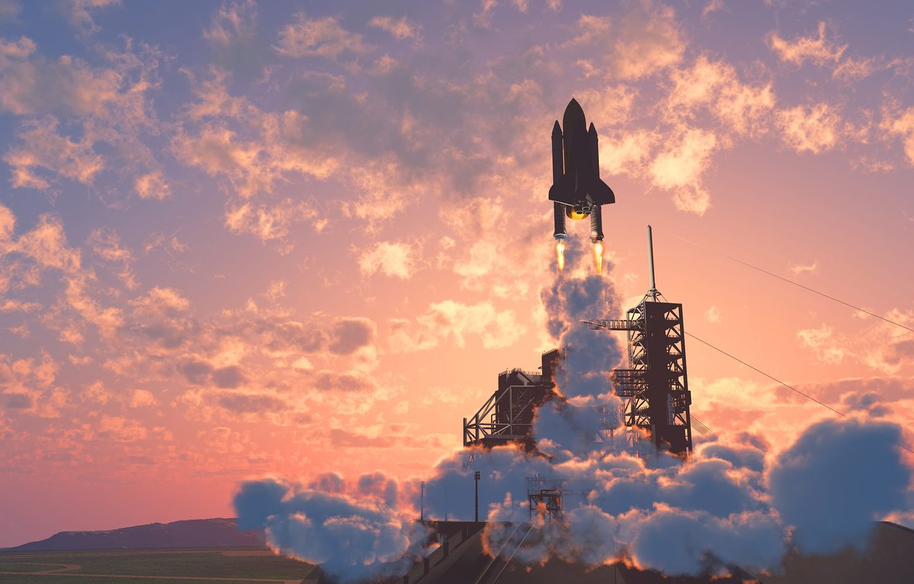 Rocket lifting off from the launch pad